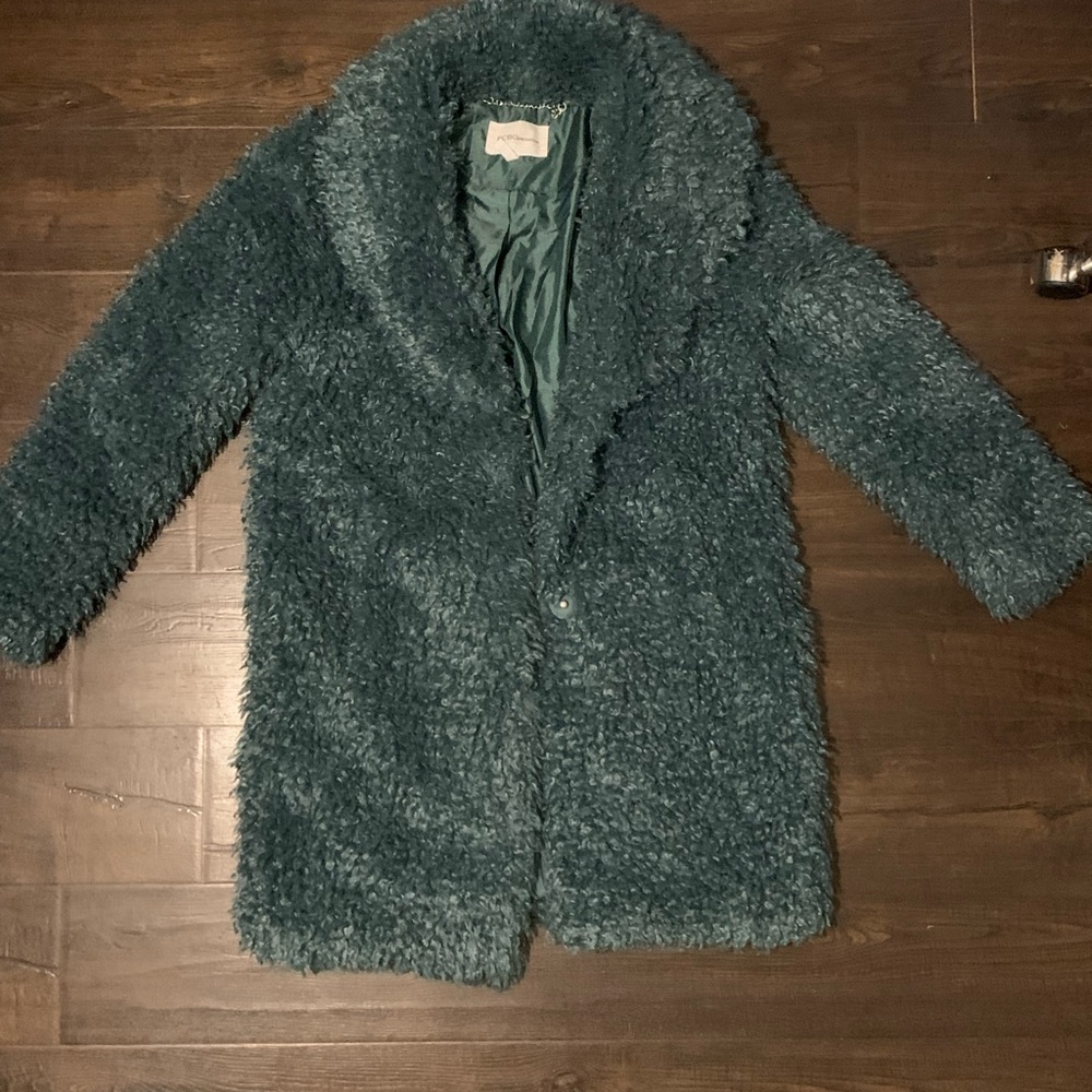 Very cute soft sweater. Feel like poodle